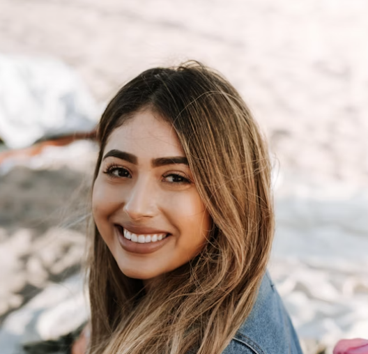 Smiling brunette woman outdoor portrait